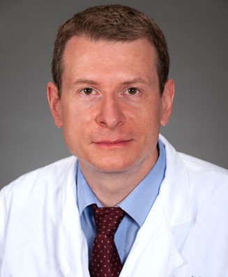 Отчего может болеть спина внизу