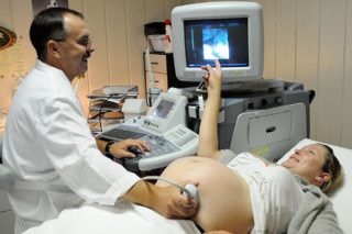 Болит спина как при месячных при беременности 39 недель