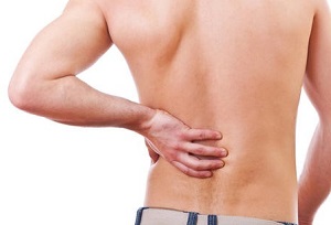 Болит спина внизу слева причины